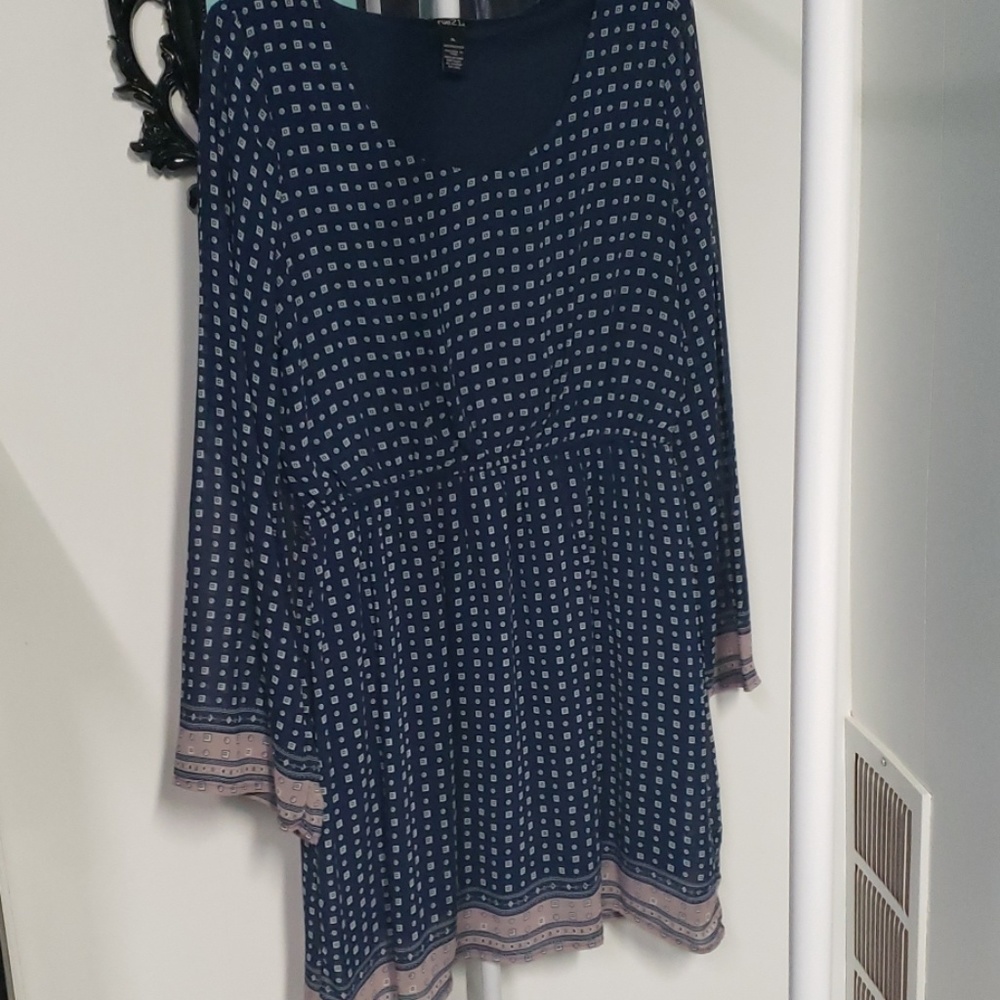 Navy dress with bell sleeves.